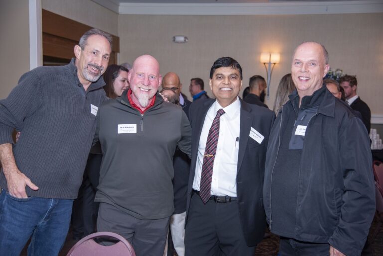 Jim Plaukovich and his Team with Mukesh Vasani