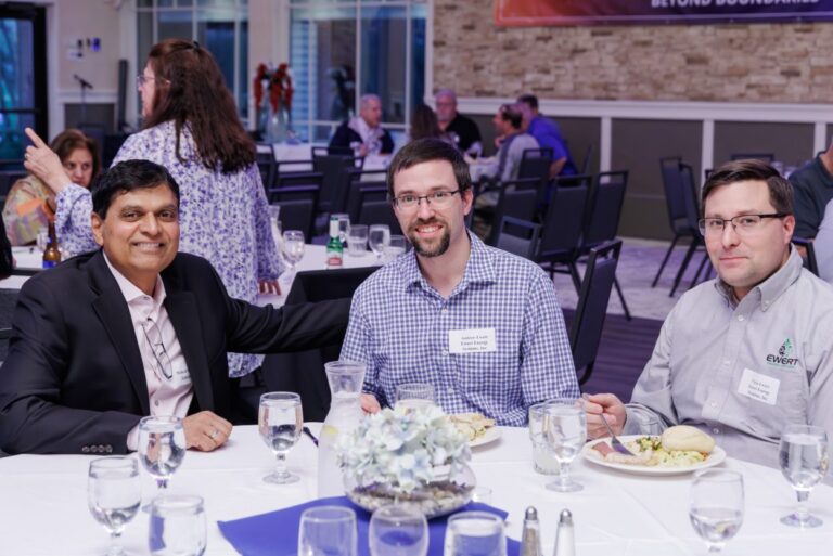 Andrew Ewert with Mukesh Vasani